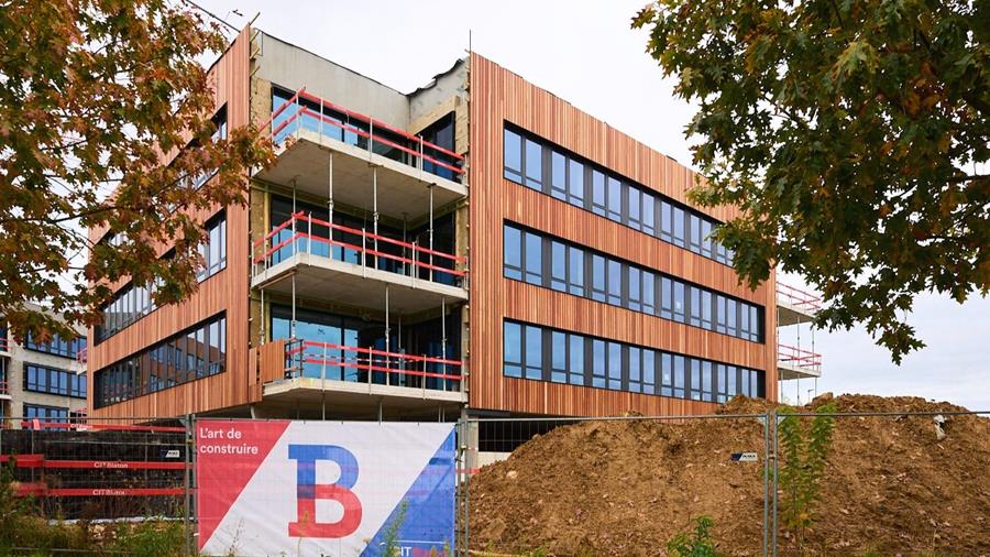 Une façade en bois pour illustrer la durabilité d'un nouveau parc de bureaux